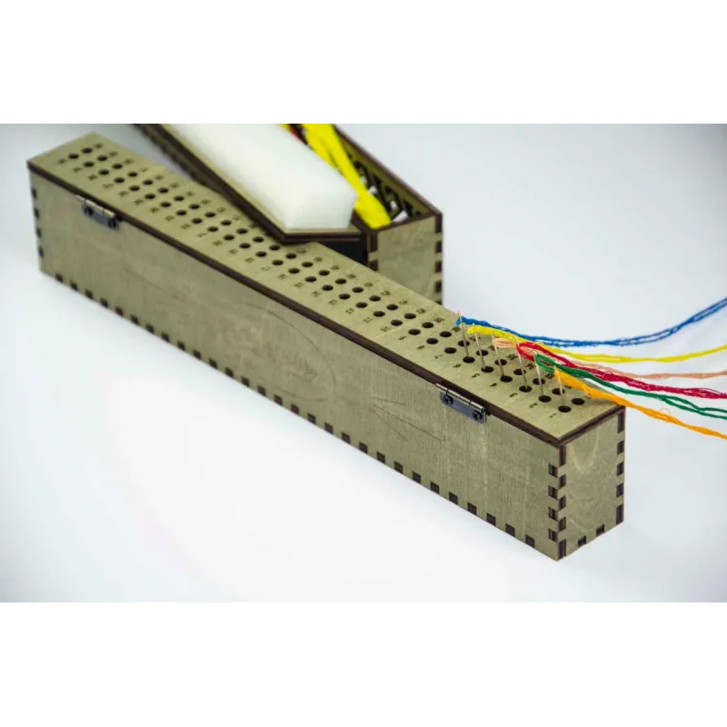 Organizer for needles on a wooden base. Carpathian spruce, 60 holes OG-005