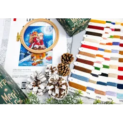 Cross stitch kit "Santa’s Secret Stop" 29x40 cm SLETIL9964