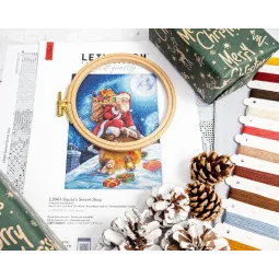 Cross stitch kit "Santa’s Secret Stop" 29x40 cm SLETIL9964