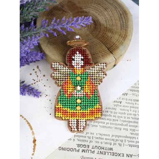 Cross-stich on wooden base "Little angel in green" 9*5 cm SO-151