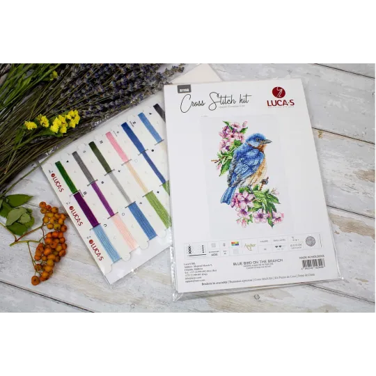 Blauer Vogel auf dem Ast SB1198